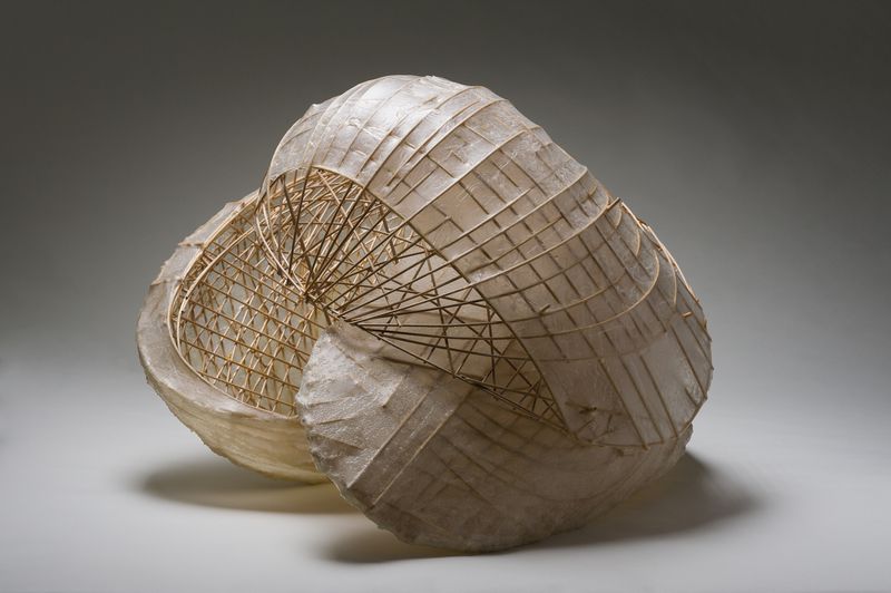 A wood and artificial membrane sculpture titled Seed by Stephen Talasnik.